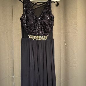 Dark blue prom dress with mesh side panels, size 3 brand A. Byer.